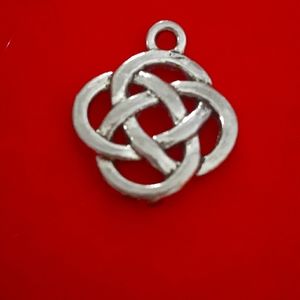 Silver Celtic knot charm